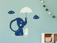 Wandaufkleber Elefant im Kinderzimmer auf bunter Wand