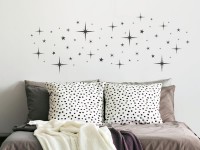 Wandtattoo Funkelnde Sterne über dem Bett